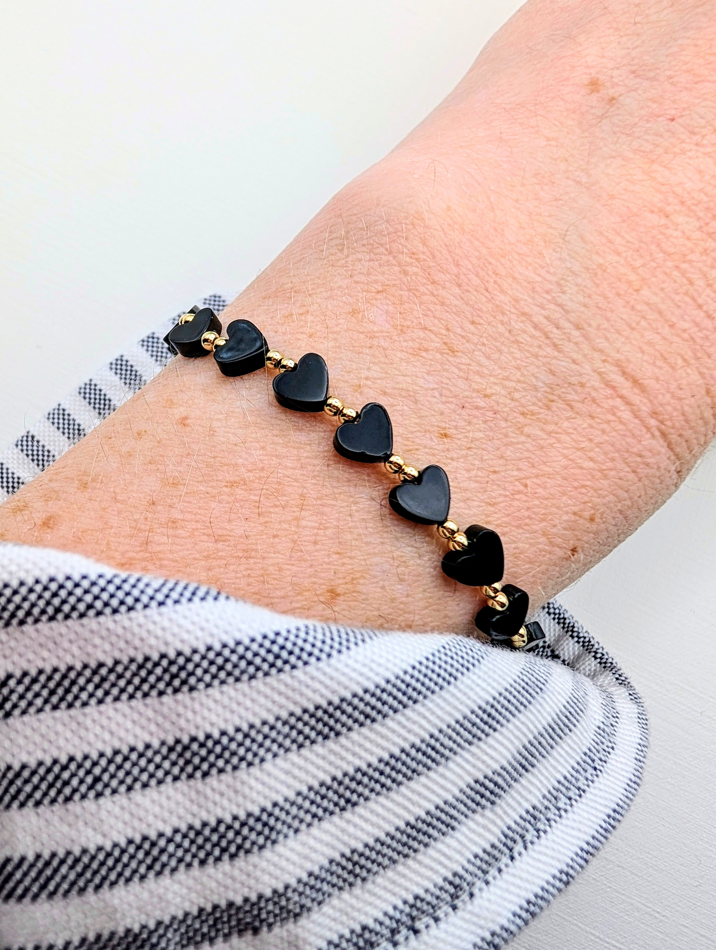 Black Onyx & Gold Heart Bracelet